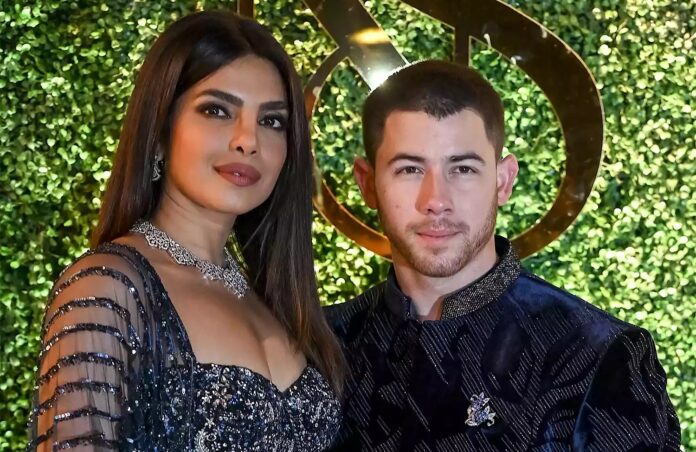 Priyanka Chopra and Nick Jonas share the moment of parents playing with daughter Maltei at a family wedding in India

